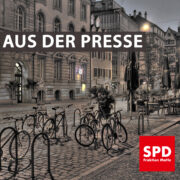 Bild von Fahrradbügeln an der Straße. Text: "Aus der Presse"