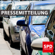 Bild von parkenden Autos. Text: "Pressemitteilung"