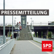 Bild vom Übergang am Bahnhof Springpfuhl. Text: "Pressemitteilung"